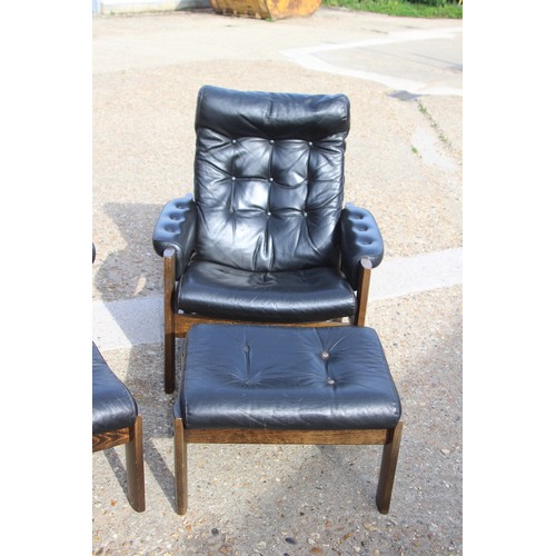 68 - PAIR OF RETRO EKORNES BLACK LEATHER CHAIRS AND FOOTSTOOLS 
80 X 72 X 98CM