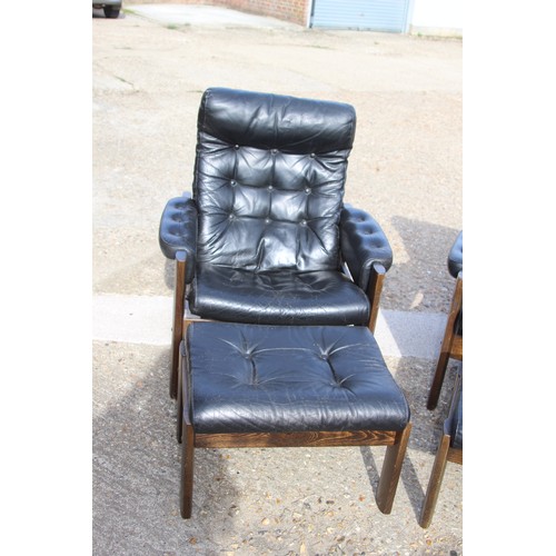 68 - PAIR OF RETRO EKORNES BLACK LEATHER CHAIRS AND FOOTSTOOLS 
80 X 72 X 98CM