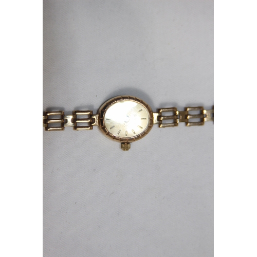 1145 - 9CT GOLD LADIES WATCH AND STRAP - 9.20G