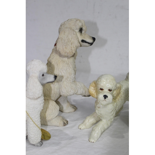 235 - QUANTITY OF DOG FIGURES