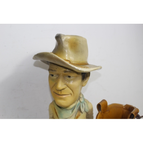 307 - JOHN WAYNE FIGURE, BUST OF BUFFALO BILL AND A CERAMIC COWBOY BOOT
45CM