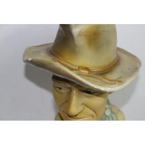 307 - JOHN WAYNE FIGURE, BUST OF BUFFALO BILL AND A CERAMIC COWBOY BOOT
45CM