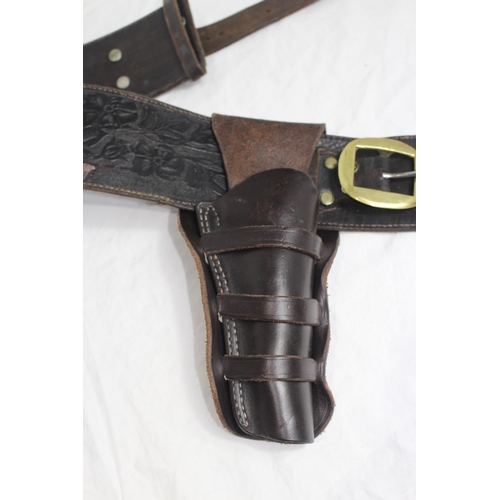 309 - 2 X LEATHER COWBOY BELTS AND HOLSTERS ETC