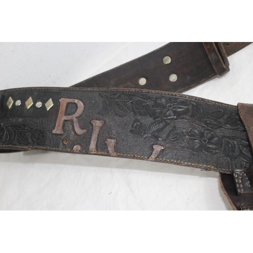 309 - 2 X LEATHER COWBOY BELTS AND HOLSTERS ETC