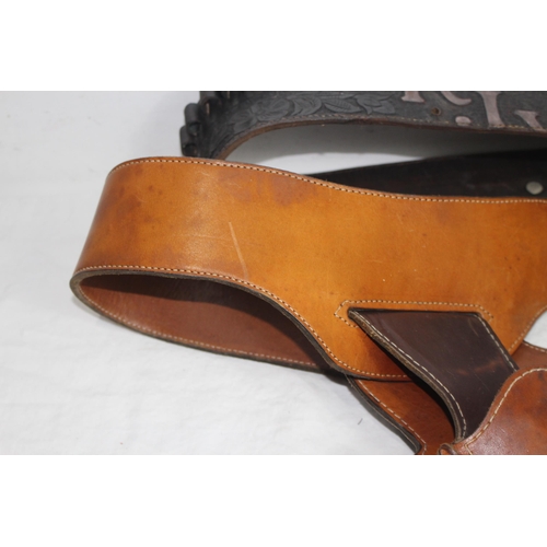 309 - 2 X LEATHER COWBOY BELTS AND HOLSTERS ETC