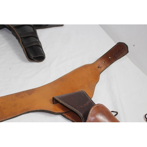 309 - 2 X LEATHER COWBOY BELTS AND HOLSTERS ETC