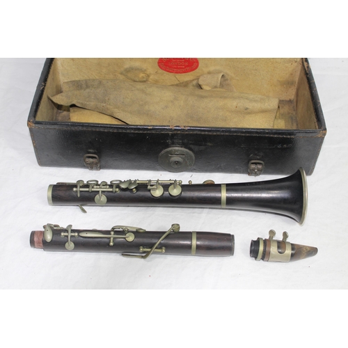 314 - VINTAGE CASED HAWKIN AND SON CLARINET AND BOOSEY CASE