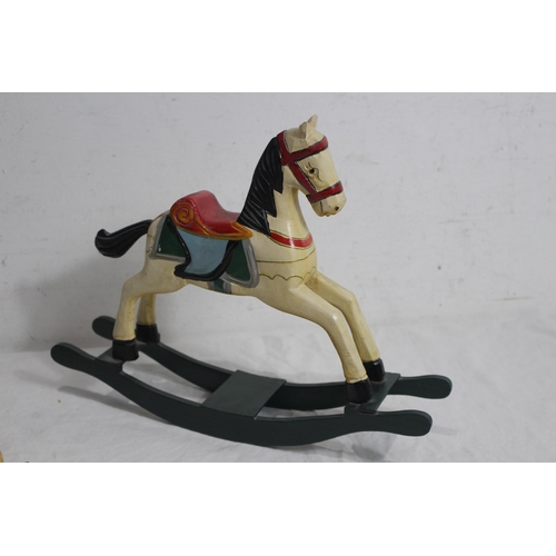 557 - 2 X TOY WOODEN ROCKING HORSES