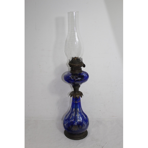 201 - VINTAGE GLASS OIL LAMP
68cm