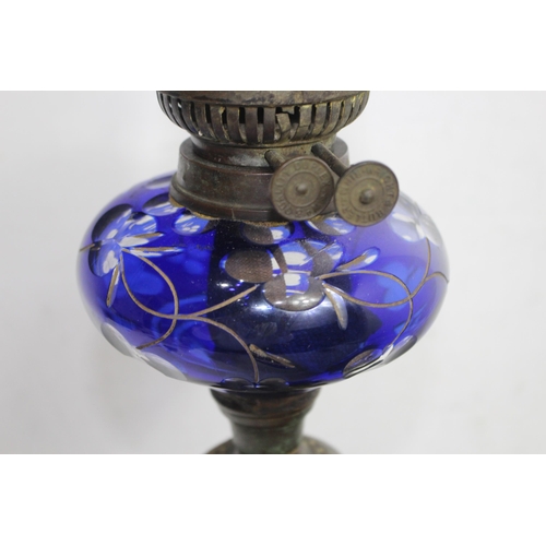 201 - VINTAGE GLASS OIL LAMP
68cm