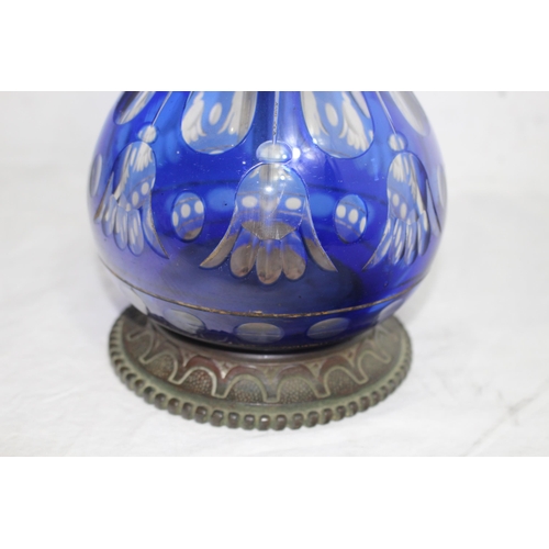 201 - VINTAGE GLASS OIL LAMP
68cm