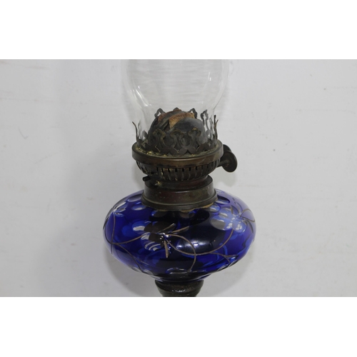 201 - VINTAGE GLASS OIL LAMP
68cm