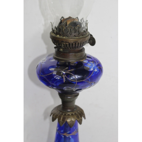 201 - VINTAGE GLASS OIL LAMP
68cm