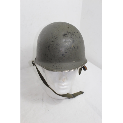 716 - AMERICAN MILITARY HELMET AND LINER