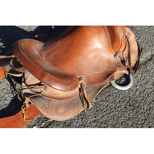 352 - LEATHER HORSE SADDLE AND STIRRUPS