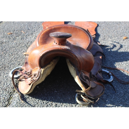 352 - LEATHER HORSE SADDLE AND STIRRUPS