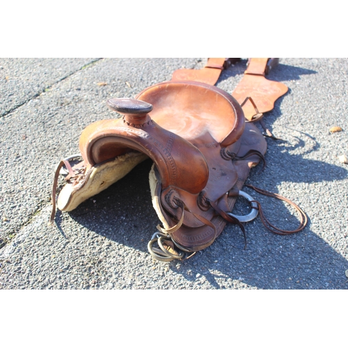 352 - LEATHER HORSE SADDLE AND STIRRUPS