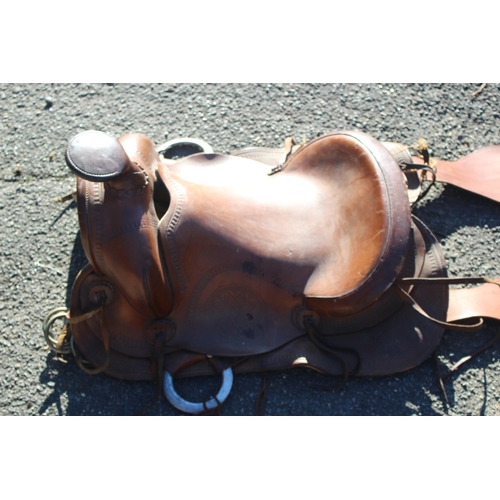 352 - LEATHER HORSE SADDLE AND STIRRUPS