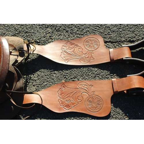 352 - LEATHER HORSE SADDLE AND STIRRUPS