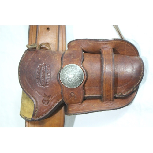 356 - QUANTITY OF BROWN LEATHER GUN HOLSTERS ETC