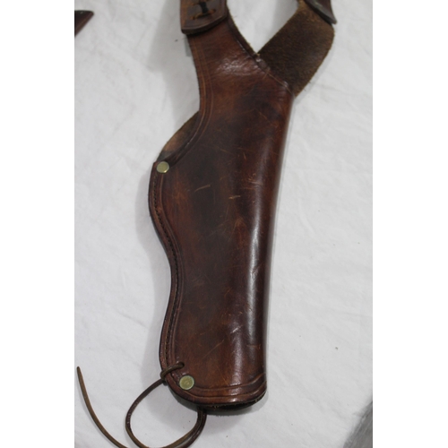 356 - QUANTITY OF BROWN LEATHER GUN HOLSTERS ETC