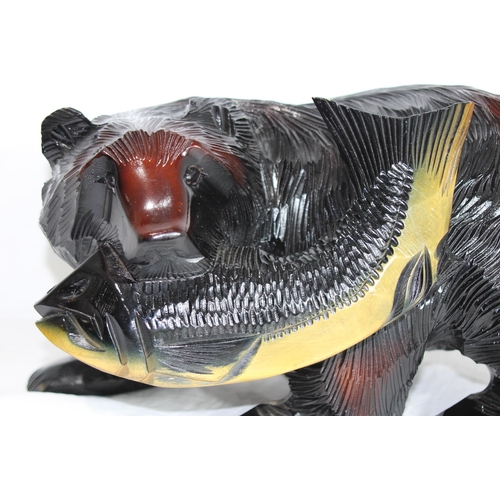 808 - LARGE JAPANESE CARVING OF A BEAR CATCHING FISH
42 X 25CM