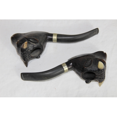 812 - TWO PAIRS OF VINTAGE NOVELTY PIPES