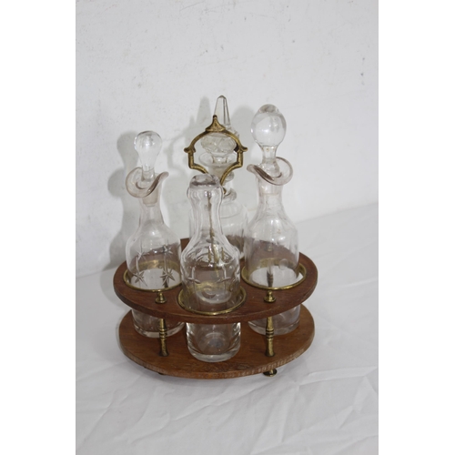 255 - VINTAGE CONDIMENT BOTTLES AND HOLDER