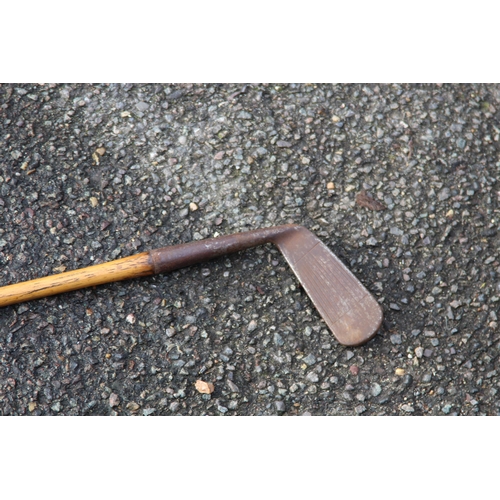 375 - ANTIQUE IRON GOLF CLUB STAMPED L22 BY F G STEF