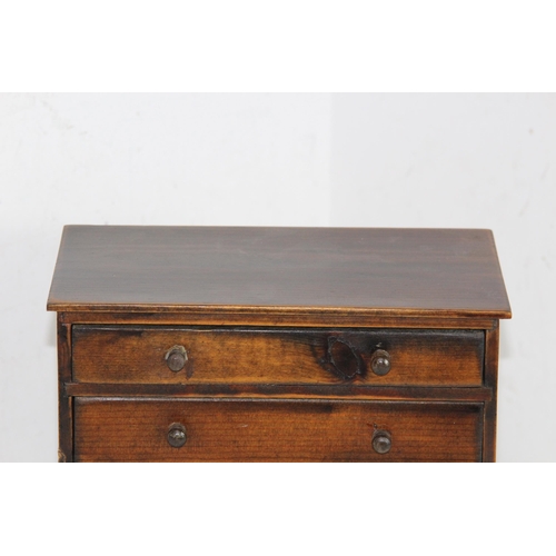 422 - VINTAGE MINIATURE CHEST OF DRAWERS
23.5 X 23 X 12CM