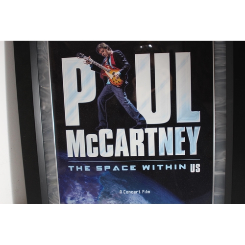 181 - PAUL McCARTNEY THE SPACE WITHIN US MEMROBILLIA FRAME WITH BOOK 
84 X 54CM