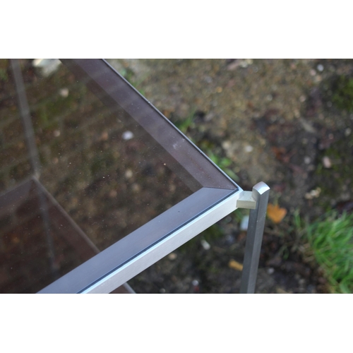 97 - PAIR OF GLASS AND CHROME SIDE TABLES (MQ)
56 X 64CM