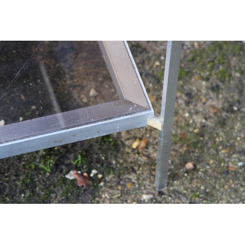 97 - PAIR OF GLASS AND CHROME SIDE TABLES (MQ)
56 X 64CM