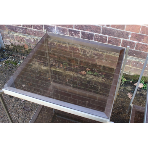 97 - PAIR OF GLASS AND CHROME SIDE TABLES (MQ)
56 X 64CM