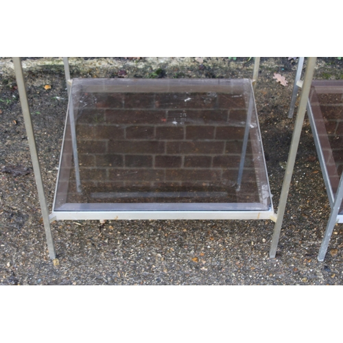 97 - PAIR OF GLASS AND CHROME SIDE TABLES (MQ)
56 X 64CM