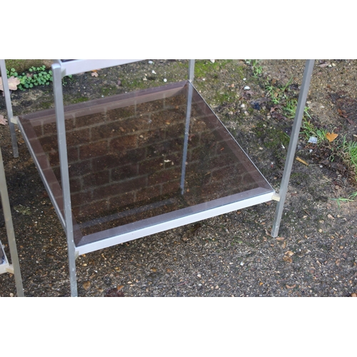 97 - PAIR OF GLASS AND CHROME SIDE TABLES (MQ)
56 X 64CM