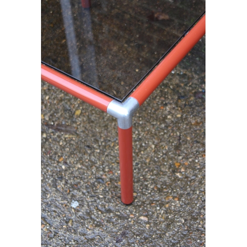 13 - VINTAGE RODNEY KINSMAN OMK DESIGN SMOKED GLASS, CHROME AND RED TUBULAR COFFEE TABLE
60 x 37CM