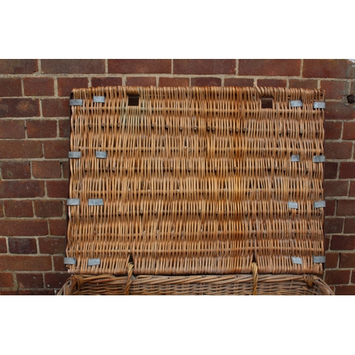 20 - LARGE VINTAGE MILL BASKET ON WOODEN WHEEL RUNNERS WITH LOCKING PEG
87 X 66 X 76CM