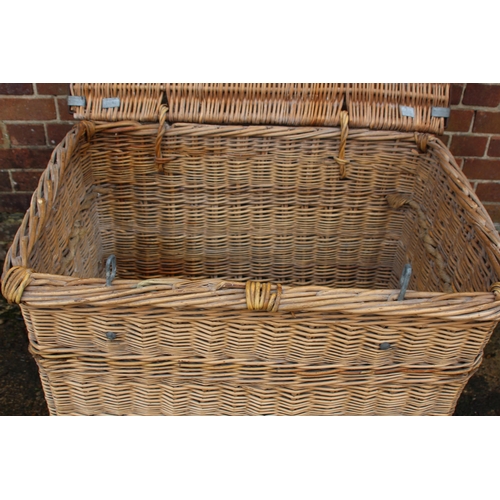 20 - LARGE VINTAGE MILL BASKET ON WOODEN WHEEL RUNNERS WITH LOCKING PEG
87 X 66 X 76CM