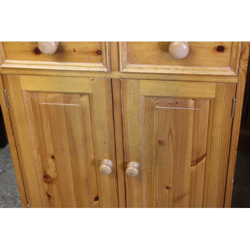 31 - TWO DOOR PINE DRESSER 
65 X 45 X 200CM