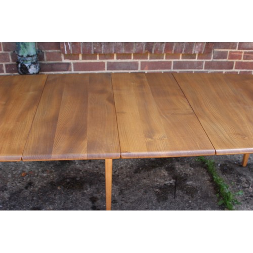 77 - BLONDE ERCOL GRAND PLANK EXTENDING TABLE
224 X 90 X 71.5CM EXTENDED 154CM NOT