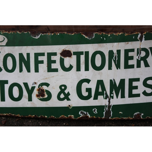 892 - VINTAGE CONFECTIONARY TOYS AND GAMES ENAMEL SIGN 
128 X 46CM