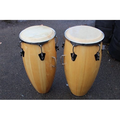 647 - PAIR OF BONGO DRUMS WITH BAGS 
77 X 36CM