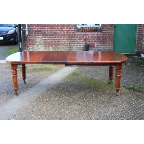 107 - ANTIQUE EDWARDIAN WIND OUT TABLE WITH TWO LEAVES
AND WINDER
145 X 120 X 74CM WITH BOTH LEAVES 236CM