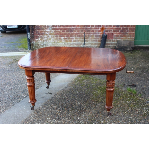 107 - ANTIQUE EDWARDIAN WIND OUT TABLE WITH TWO LEAVES
AND WINDER
145 X 120 X 74CM WITH BOTH LEAVES 236CM