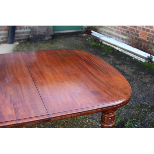 107 - ANTIQUE EDWARDIAN WIND OUT TABLE WITH TWO LEAVES
AND WINDER
145 X 120 X 74CM WITH BOTH LEAVES 236CM