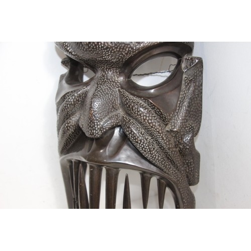 825 - LARGE ANTIQUE CARVED AFRICAN MASK
95CM