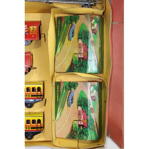 596 - BRIM TOY TIN PLATE TRAIN SET