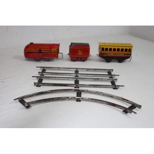 596 - BRIM TOY TIN PLATE TRAIN SET