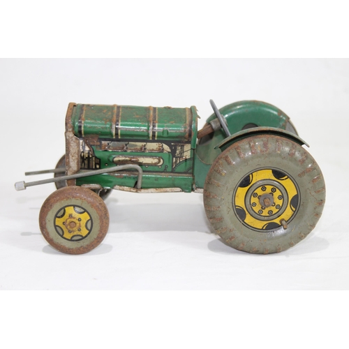 604 - VINTAGE TIN TRACTOR
20 X 12CM